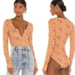 NWOT free people Dylan floral printed bodysuit color : tan combo size large.